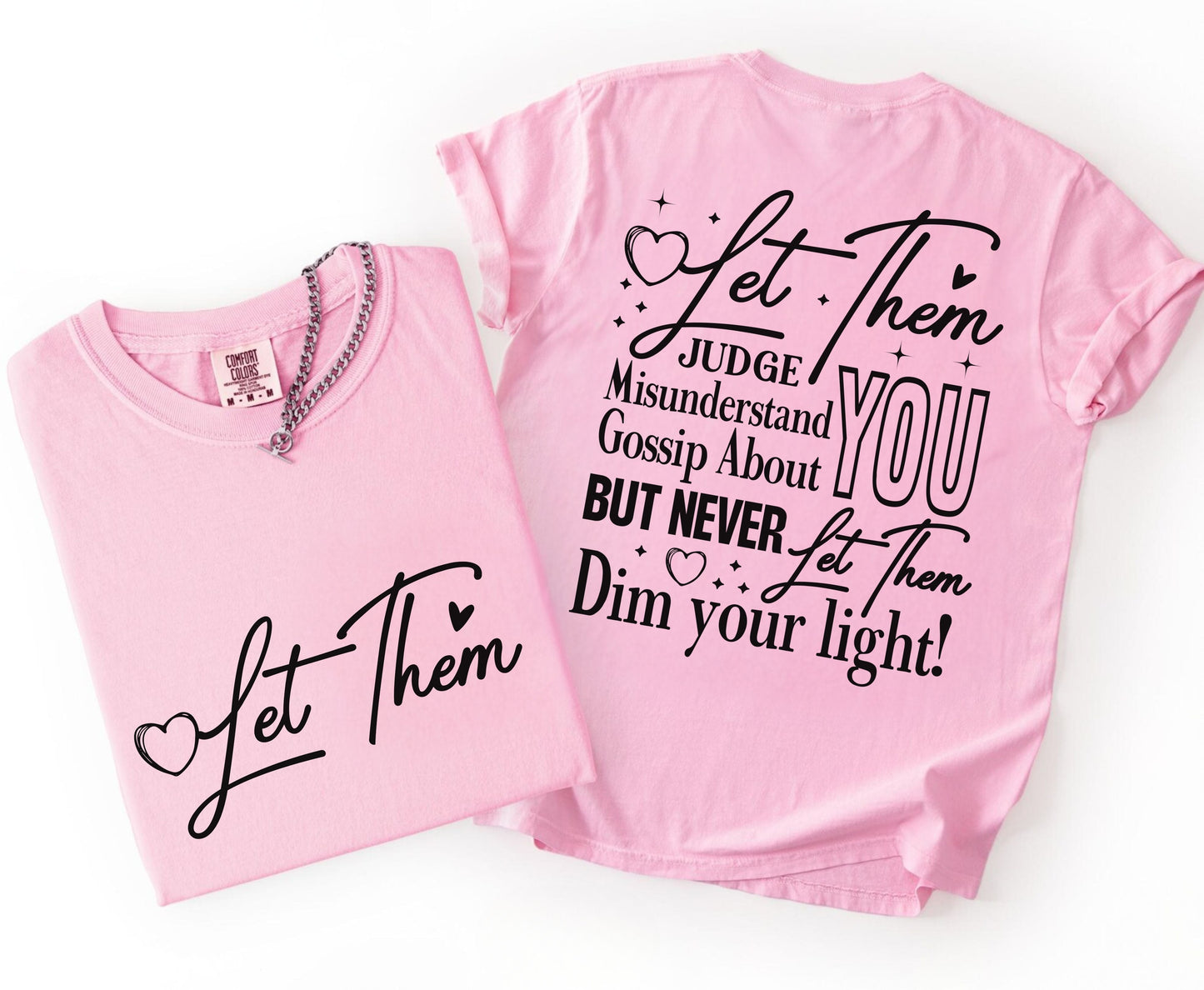 Two blossom t-shirts with motivational text on a white background