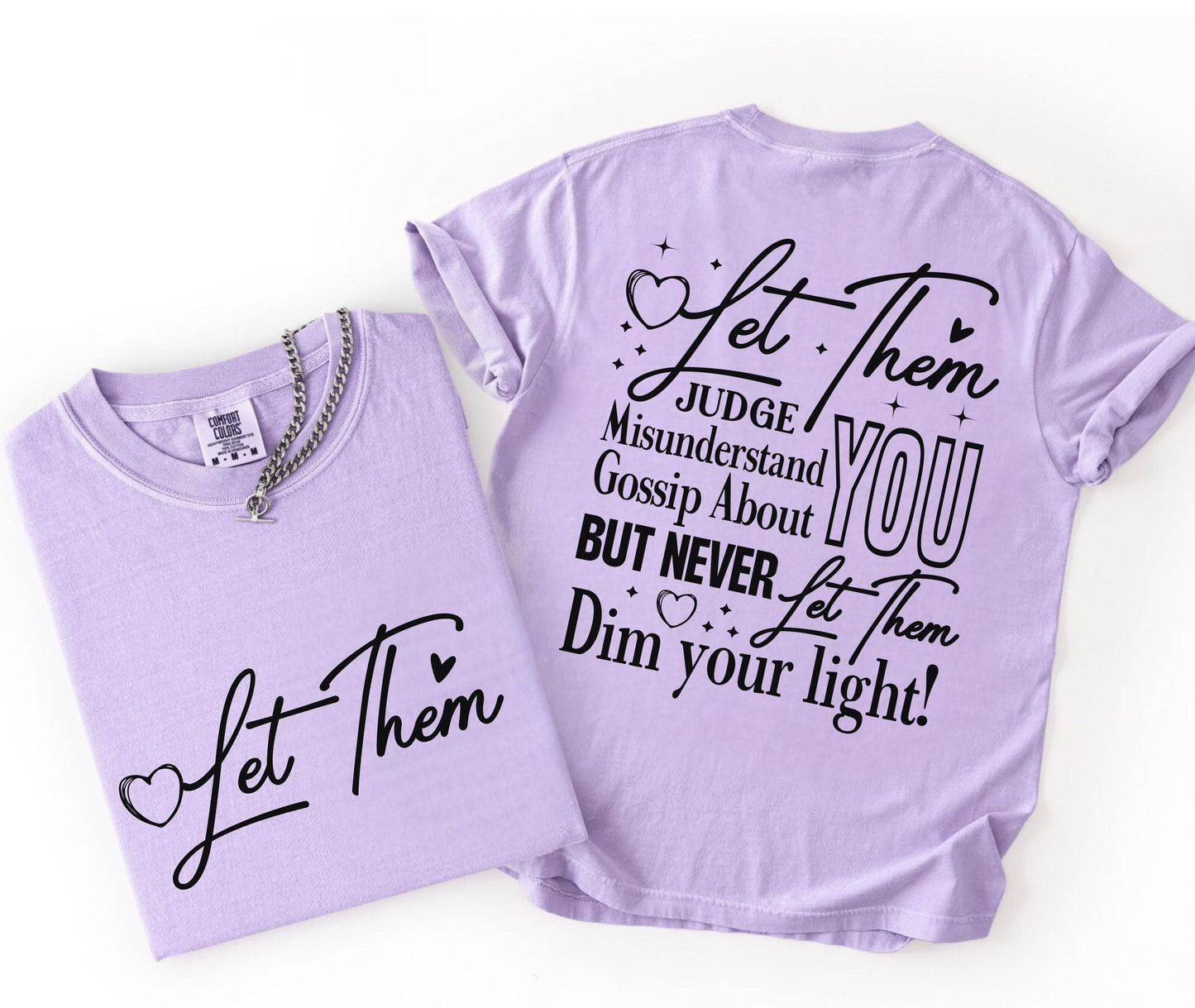 Two orchid t-shirts with motivational text on a white background
