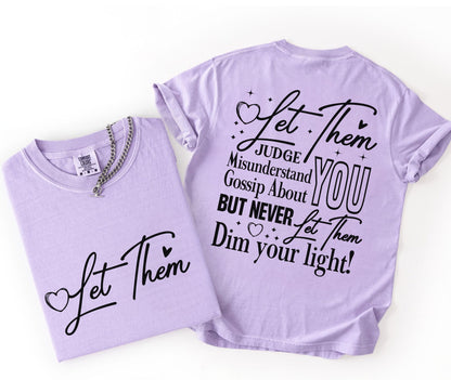 Two orchid t-shirts with motivational text on a white background