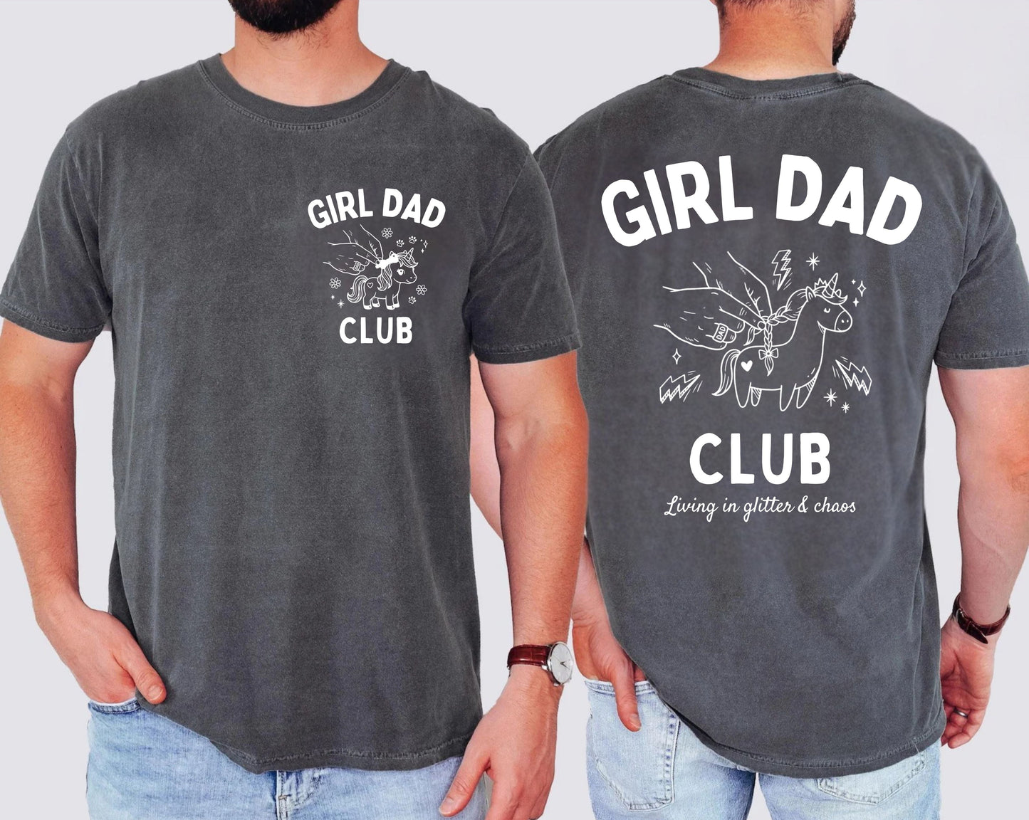 Two people wearing pepper colored t-shirts with 'Girl Dad Club' text and graphics on a plain background