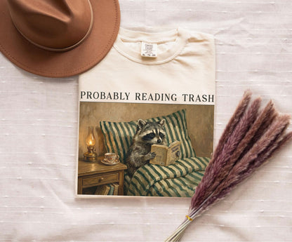 Raccoon Probably Reading Trash T-Shirt in Ivory– Funny Bookish Graphic Tee