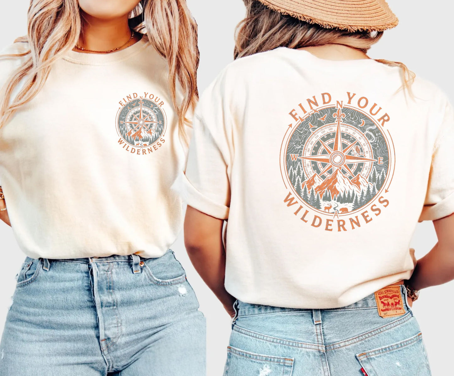 Two people wearing Ivory colored t-shirts with 'Find Your Wilderness' design on a plain background