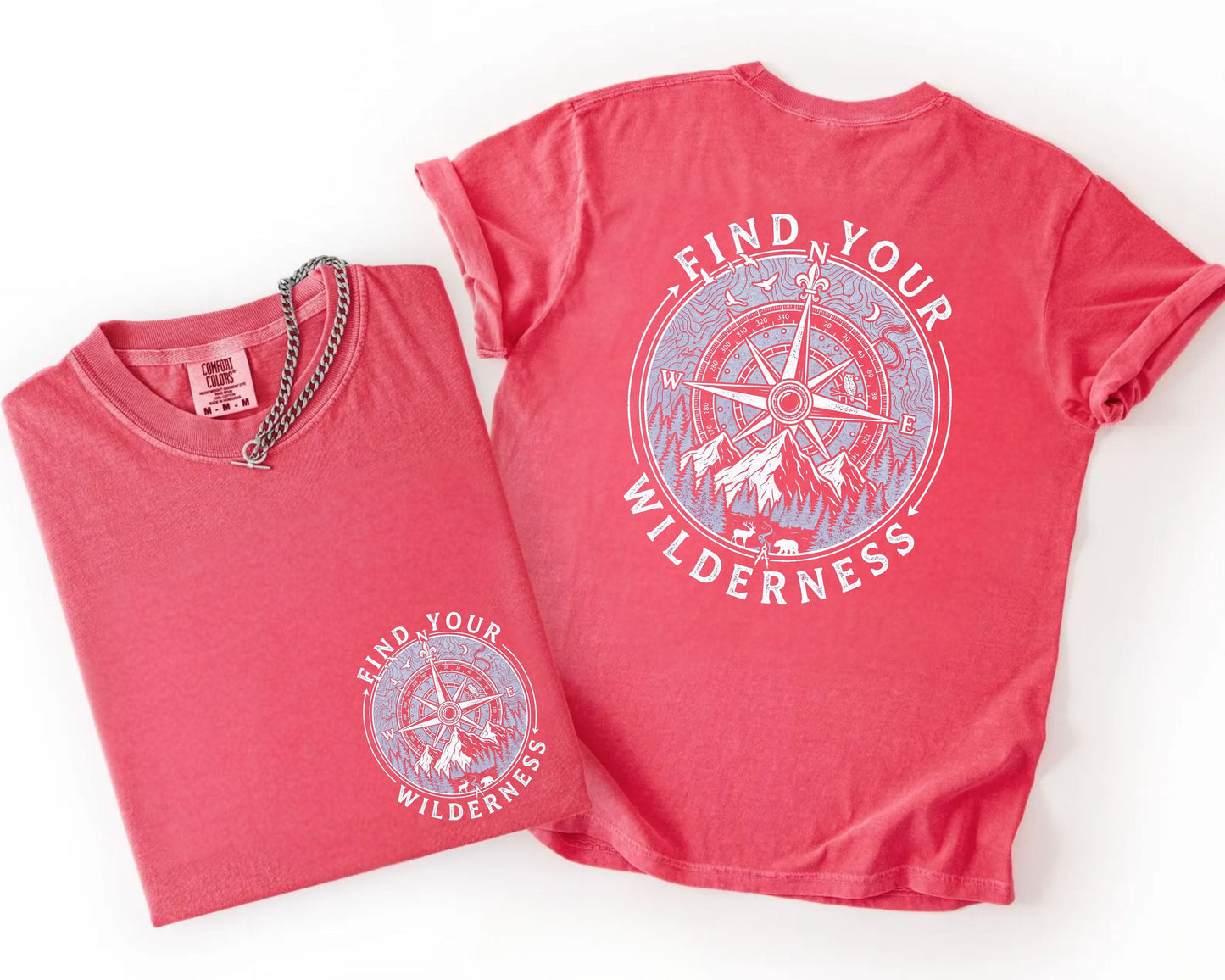 Watermelon colored t-shirt with 'Find Your Wilderness' design on a white background