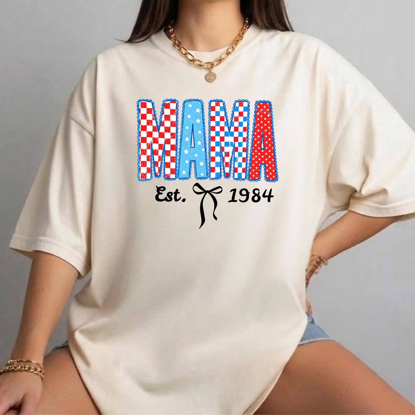 Mama Est. 1984 patriotic graphic t-shirt Ivory— garment-dyed unisex tee with checker MAMA print