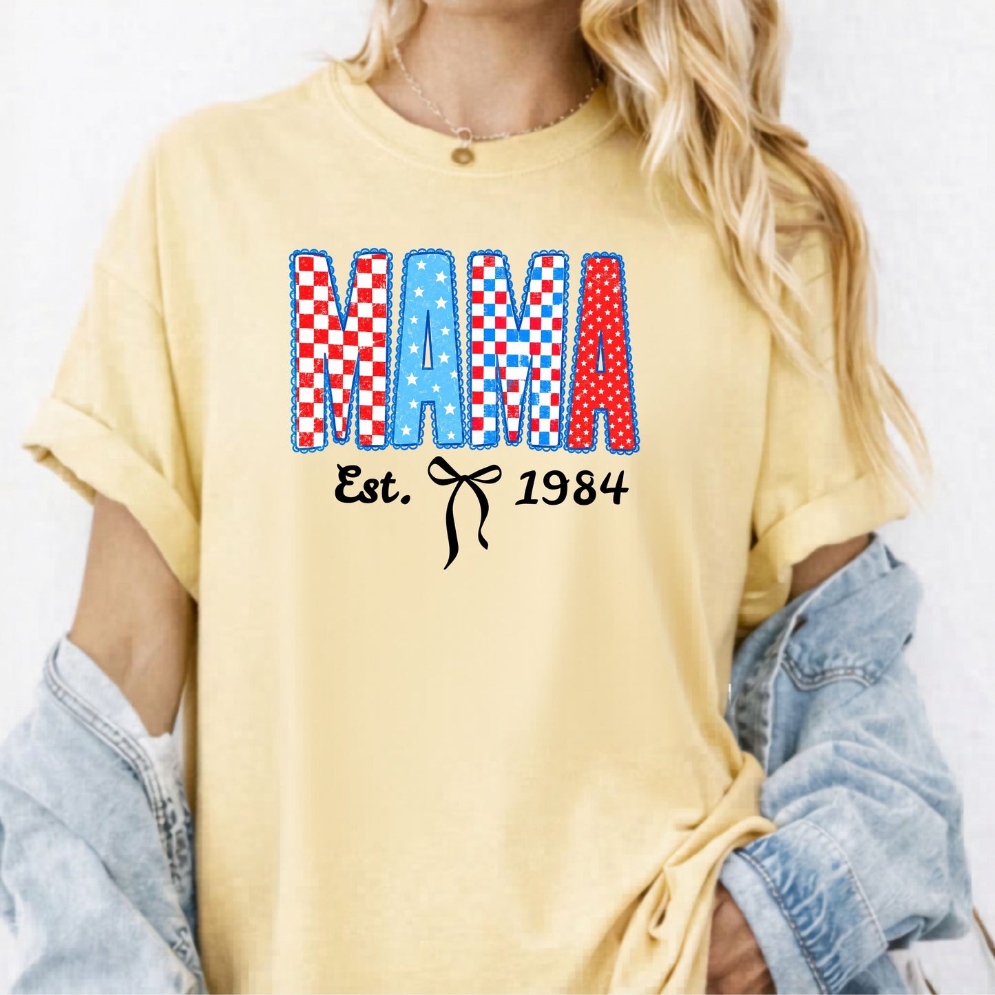 Mama Est. 1984 patriotic graphic t-shirt butter— garment-dyed unisex tee with checker MAMA print