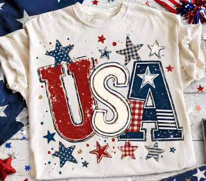 USA Patriotic graphic t-shirt in ivory— garment-dyed unisex tee with distressed stars and stripes

