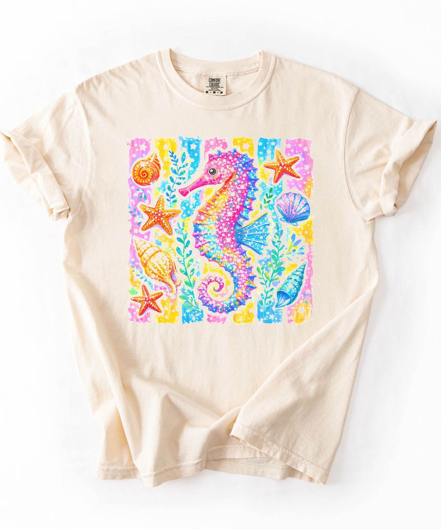 Seahorse Beach Art T-Shirt in Ivory — watercolor seahorse with shells and starfish graphic, garment-dyed comfort colors tee
