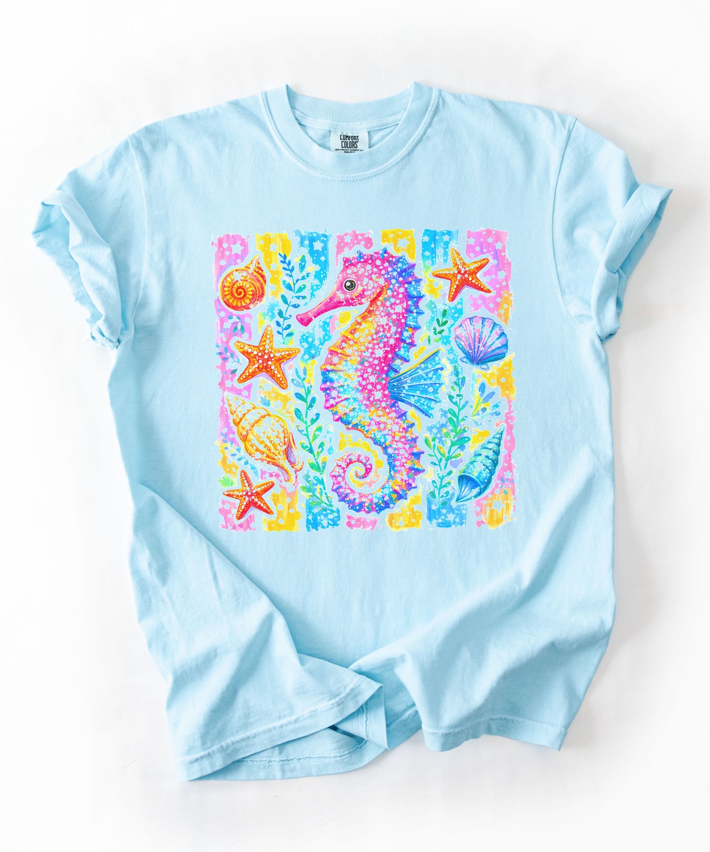 Seahorse Beach Art T-Shirt in Chambray — watercolor seahorse with shells and starfish graphic, garment-dyed comfort colors tee
