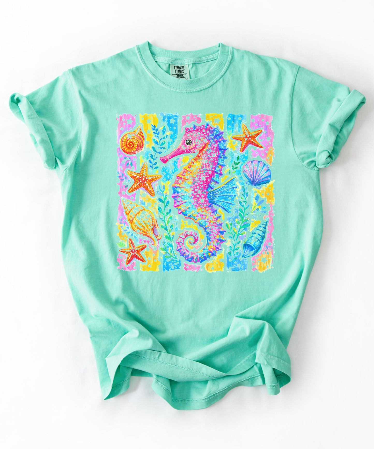 Seahorse Beach Art T-Shirt in island reef — watercolor seahorse with shells and starfish graphic, garment-dyed comfort colors tee

