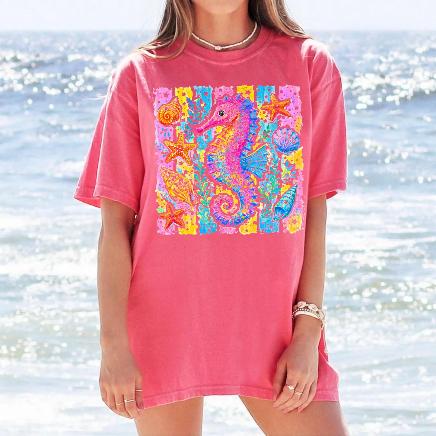 Seahorse Beach Art T-Shirt in Watermelon — watercolor seahorse with shells and starfish graphic, garment-dyed comfort colors tee
