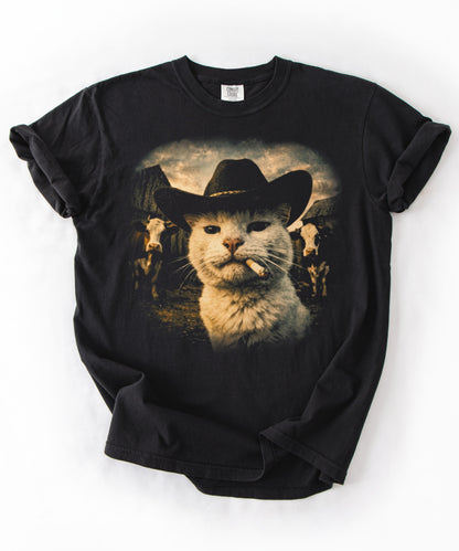  Cowboy cat graphic t-shirt in black — garment-dyed heavyweight tee with western ranch print, front view
