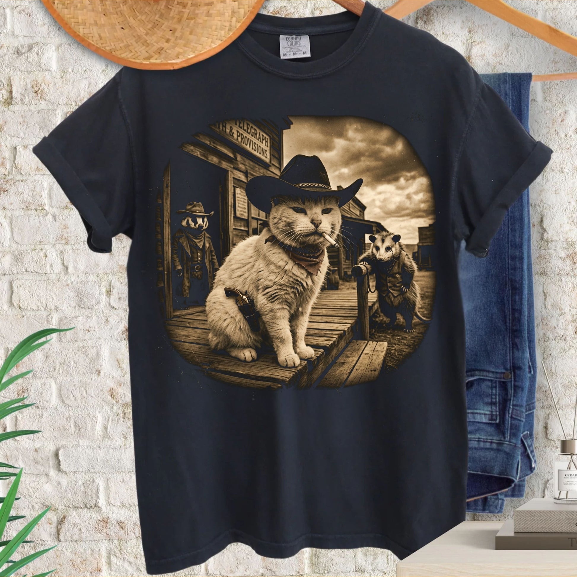 Western cowboy cat t-shirt back view — funny animal graphic tee in Black

