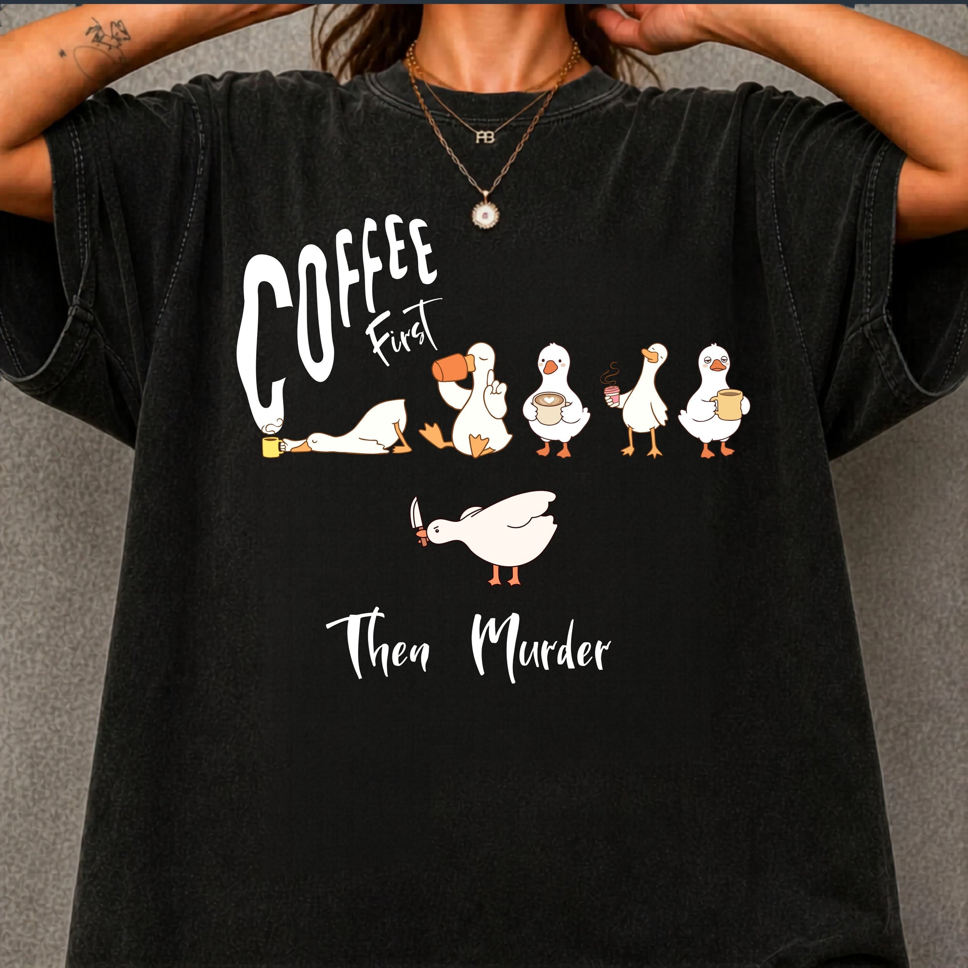 Silly Goose Coffee First t-shirt in Black — funny coffee lover graphic tee front view
