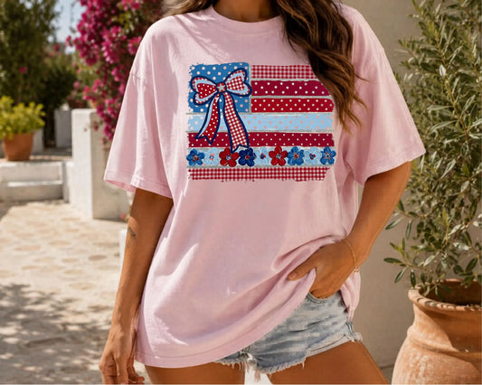 Blossom garment-dyed t-shirt with Americana patchwork flag bow graphic in red, white and blue