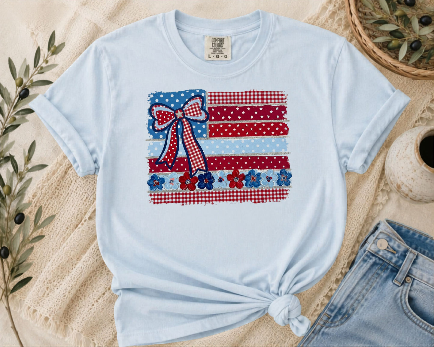 Chambray garment-dyed t-shirt with Americana patchwork flag bow graphic in red, white and blue