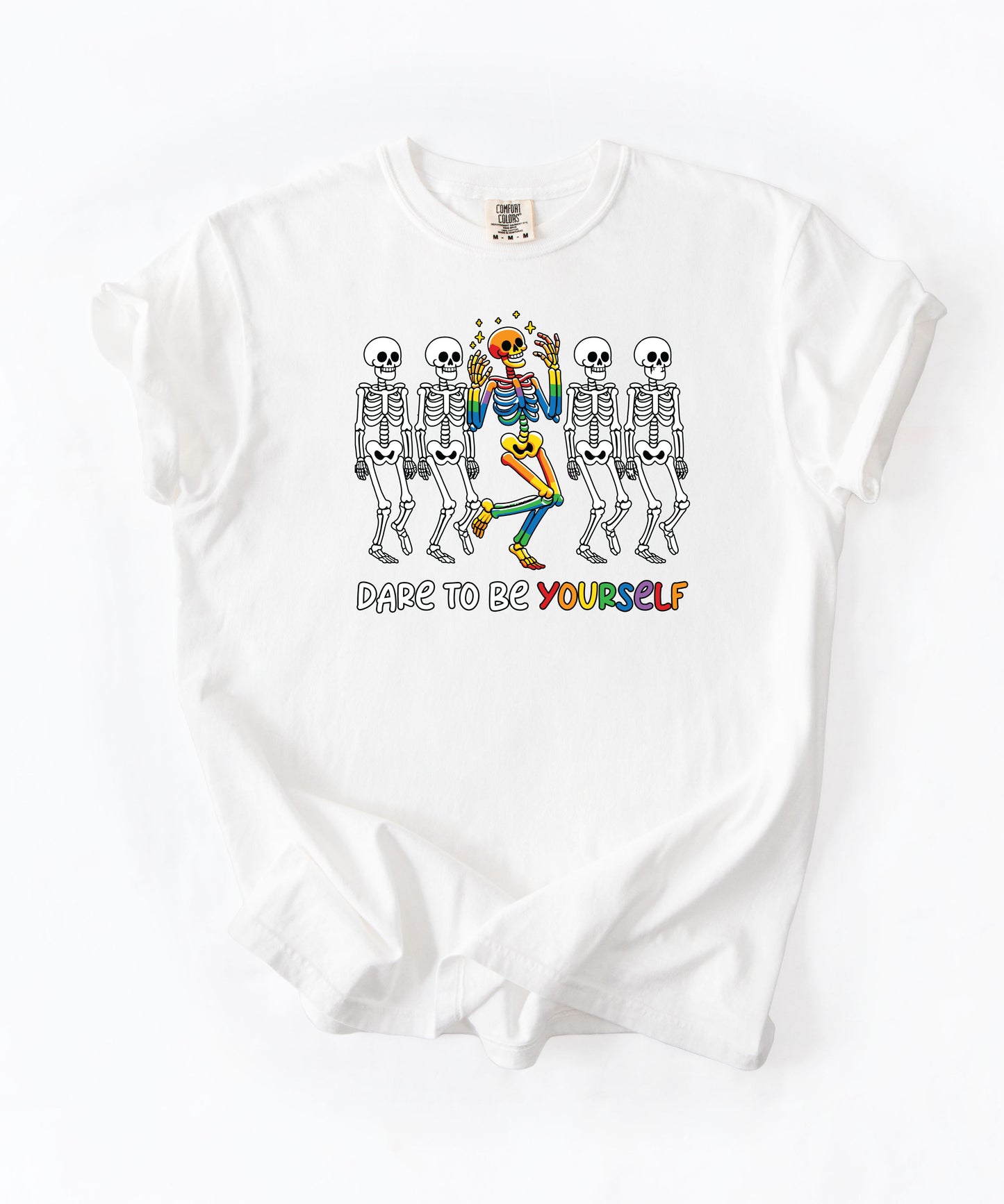 Dare to Be Yourself Rainbow Skeleton T-Shirt in White — garment-dyed Halloween Pride tee