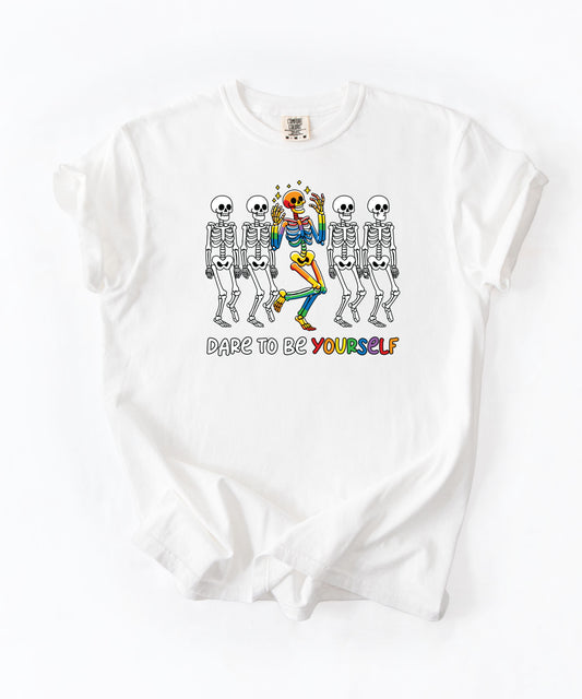 Dare to Be Yourself Rainbow Skeleton T-Shirt in White — garment-dyed Halloween Pride tee