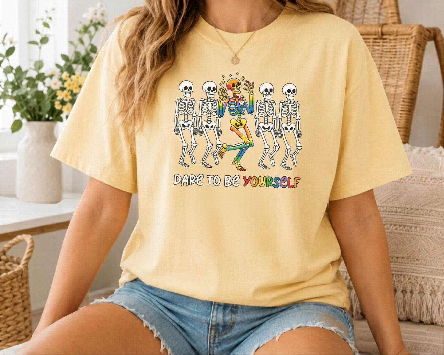 Dare to Be Yourself Rainbow Skeleton T-Shirt in Butter — garment-dyed Halloween Pride tee
