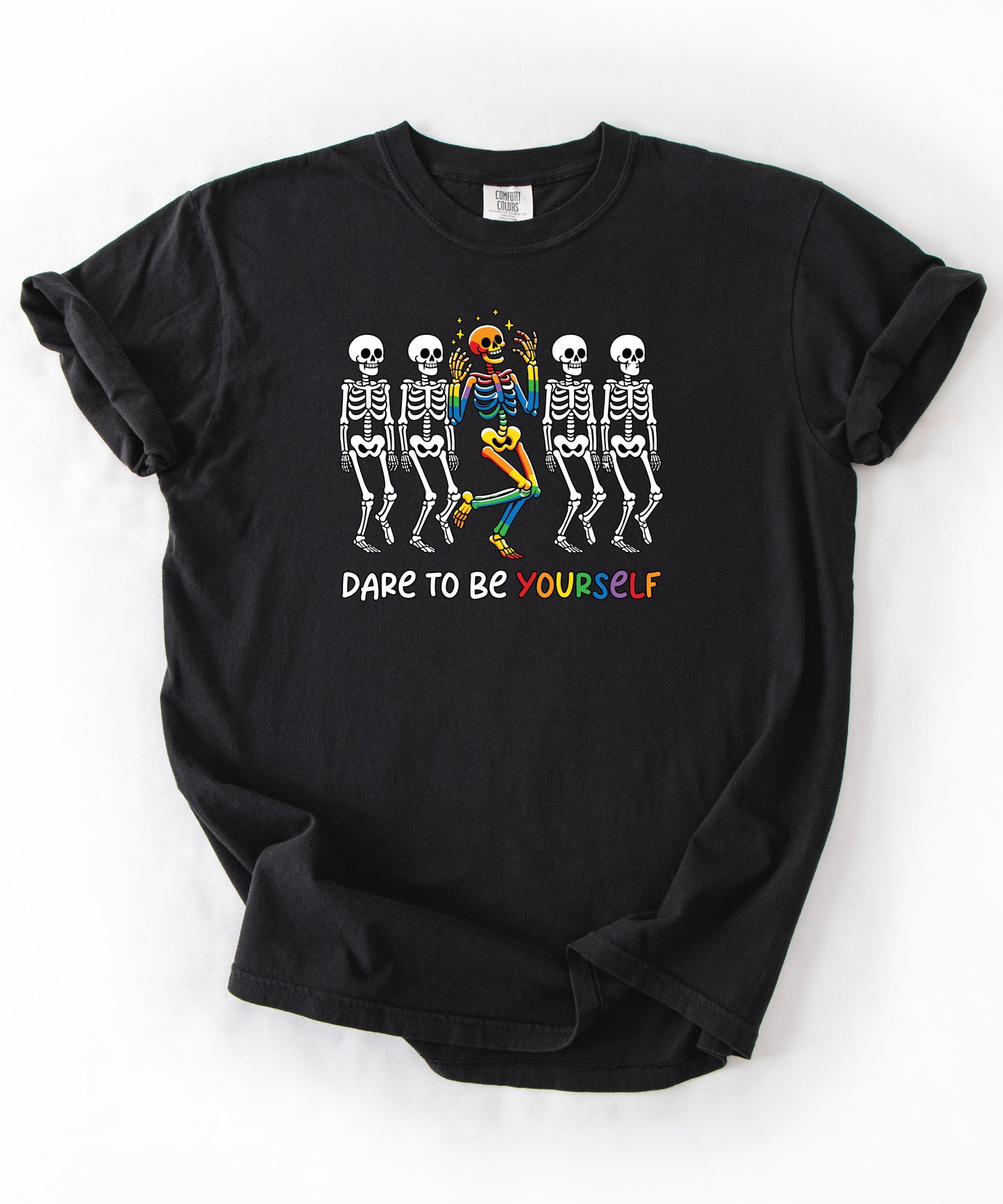 Dare to Be Yourself Rainbow Skeleton T-Shirt in Black— garment-dyed Halloween Pride tee