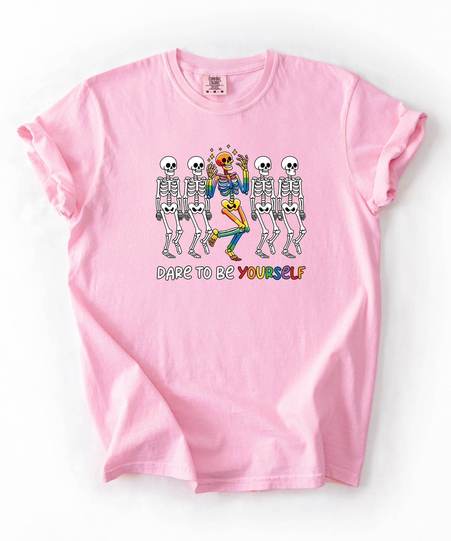Dare to Be Yourself Rainbow Skeleton T-Shirt in Blossom — garment-dyed Halloween Pride tee