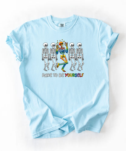Dare to Be Yourself Rainbow Skeleton T-Shirt in Chambray — garment-dyed Halloween Pride tee