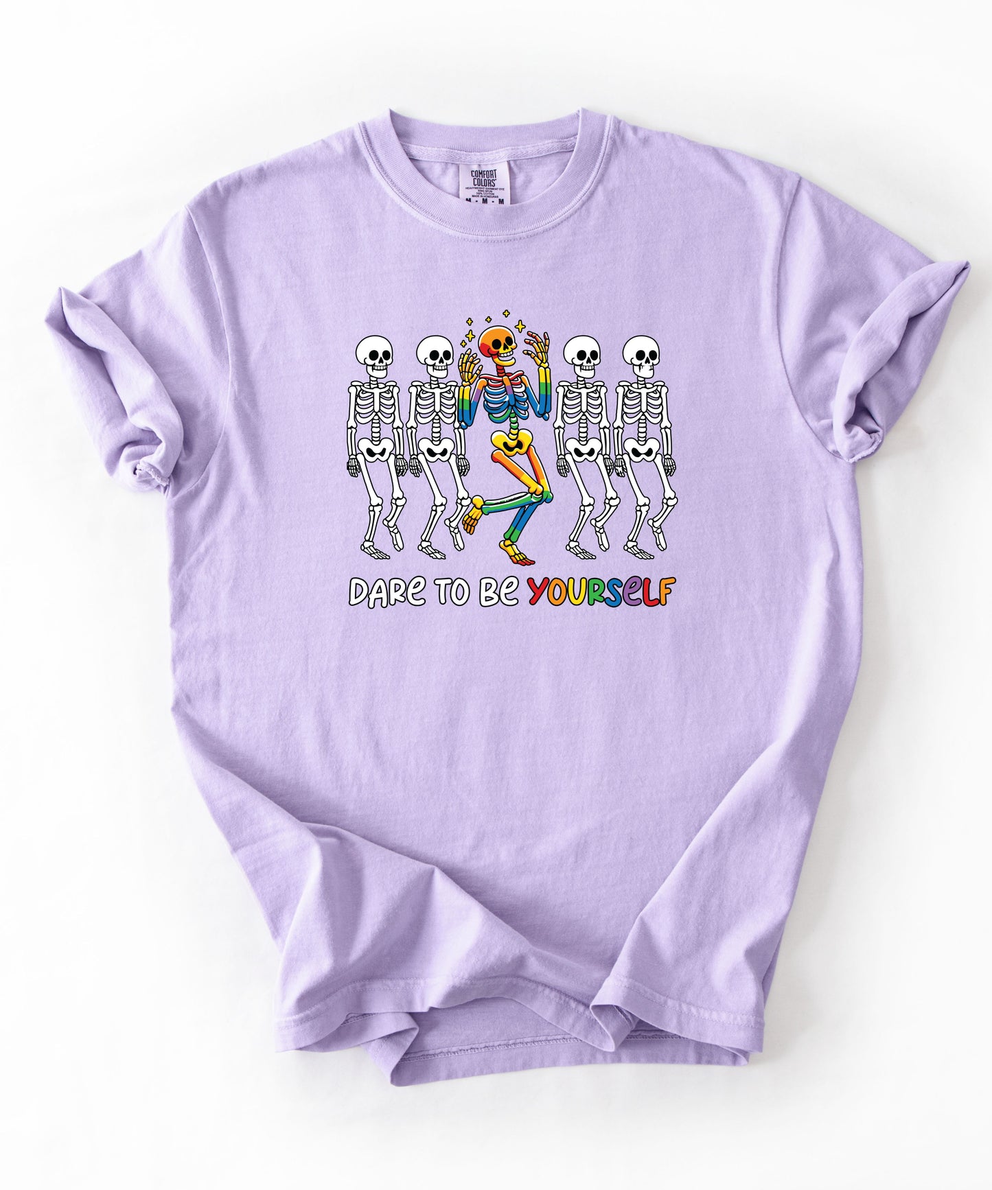 Dare to Be Yourself Rainbow Skeleton T-Shirt in orchid— garment-dyed Halloween Pride tee
