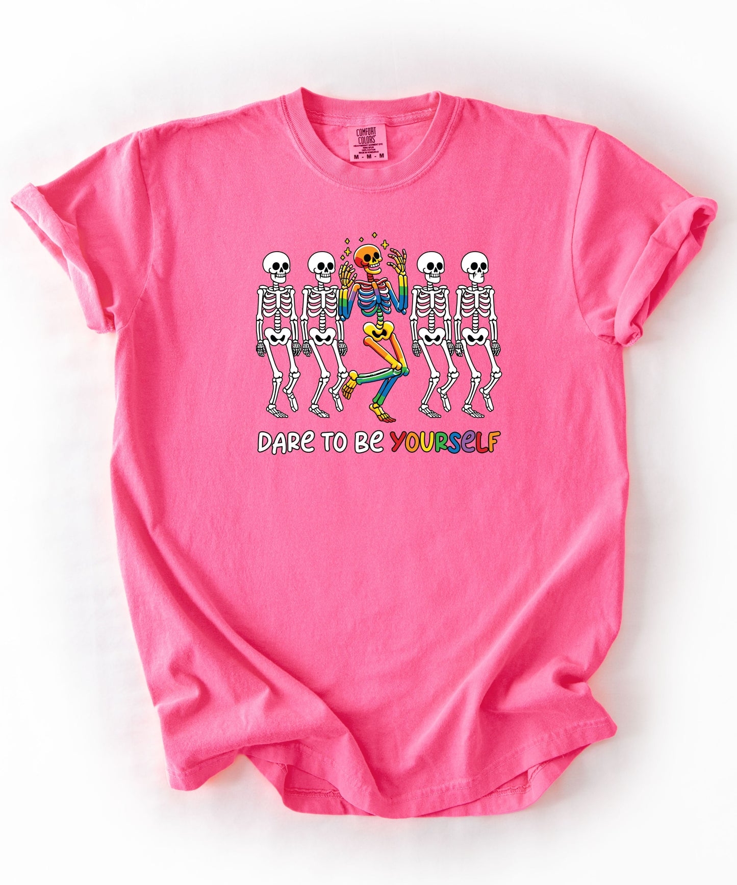 Dare to Be Yourself Rainbow Skeleton T-Shirt in Neon Pink — garment-dyed Halloween Pride tee