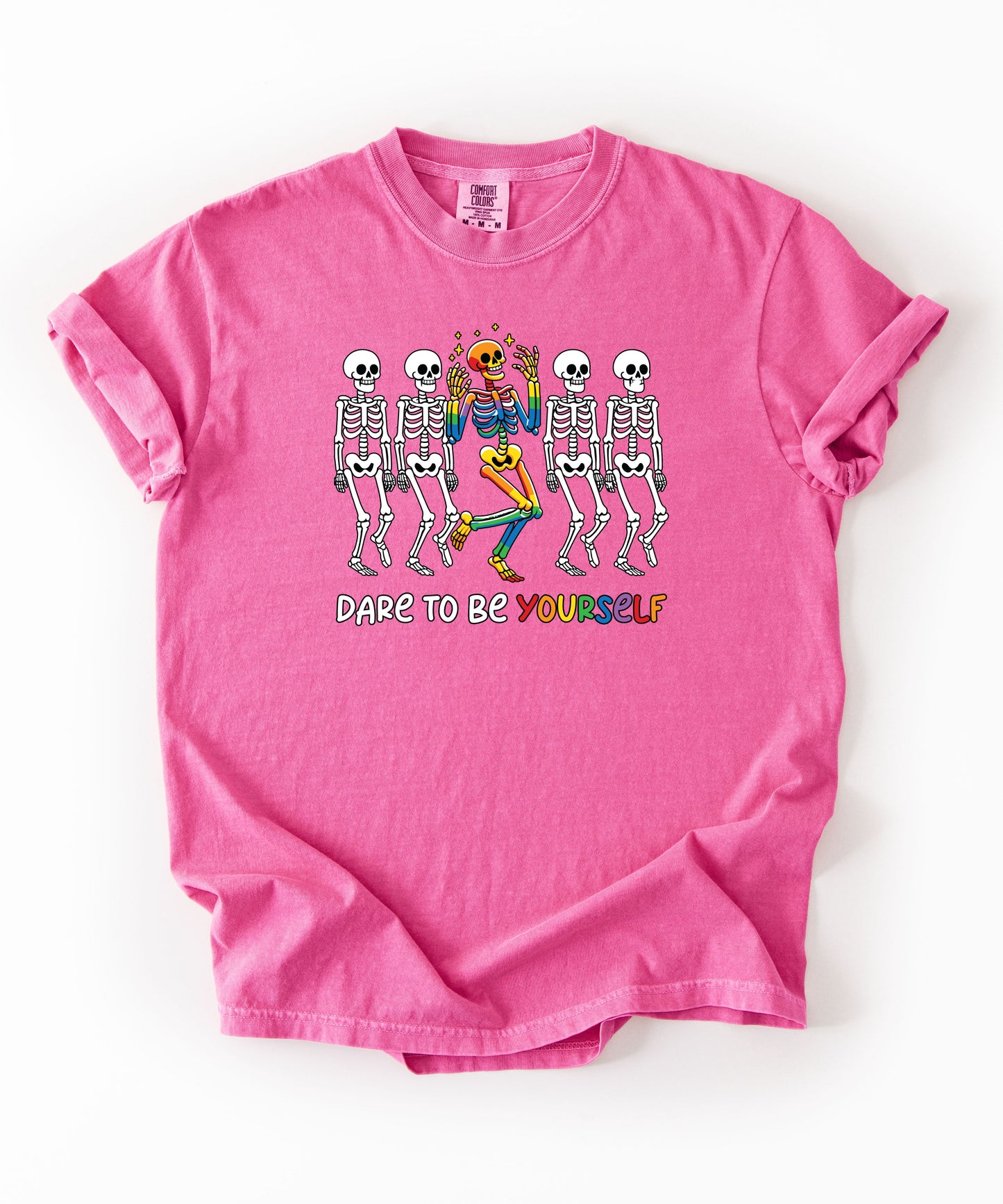 Dare to Be Yourself Rainbow Skeleton T-Shirt in Crunchberry — garment-dyed Halloween Pride tee