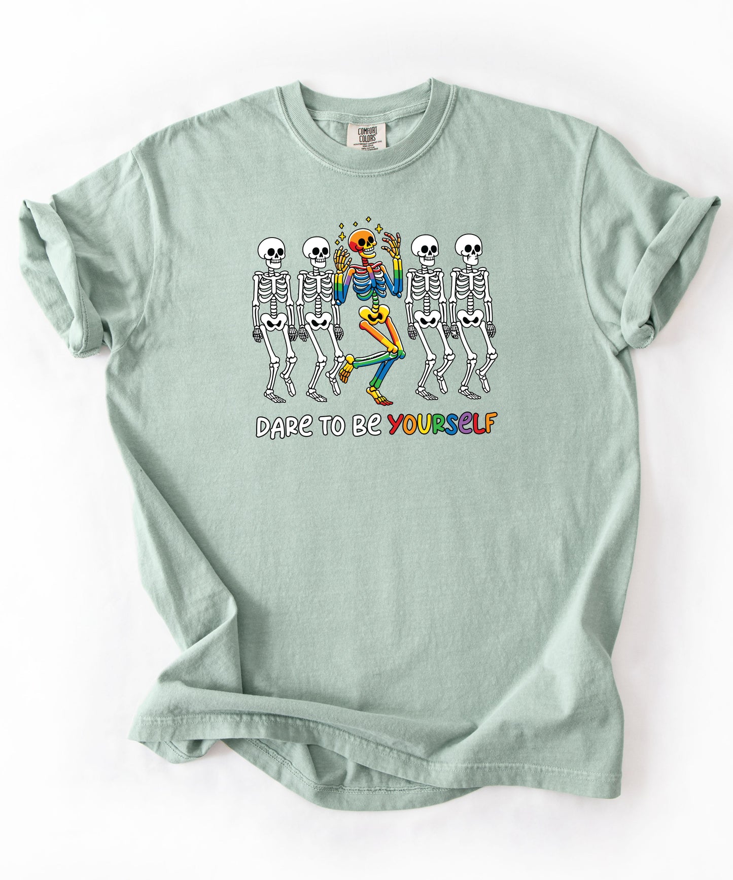 Dare to Be Yourself Rainbow Skeleton T-Shirt in Bay — garment-dyed Halloween Pride tee