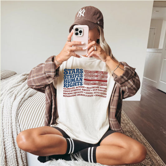 Ivory garment-dyed Stars & Stripes Human Rights T-Shirt, patriotic social justice graphic tee in heavyweight ring-spun cotton