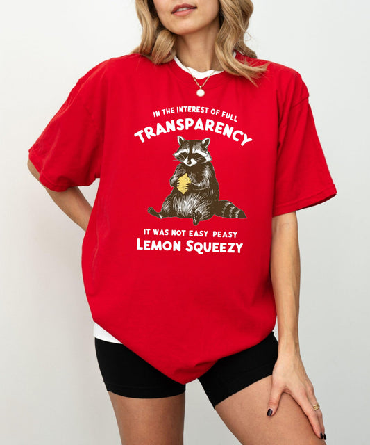 Funny raccoon sarcastic meme t-shirt in Red — "Was Not Easy Peasy Lemon Squeezy" graphic tee