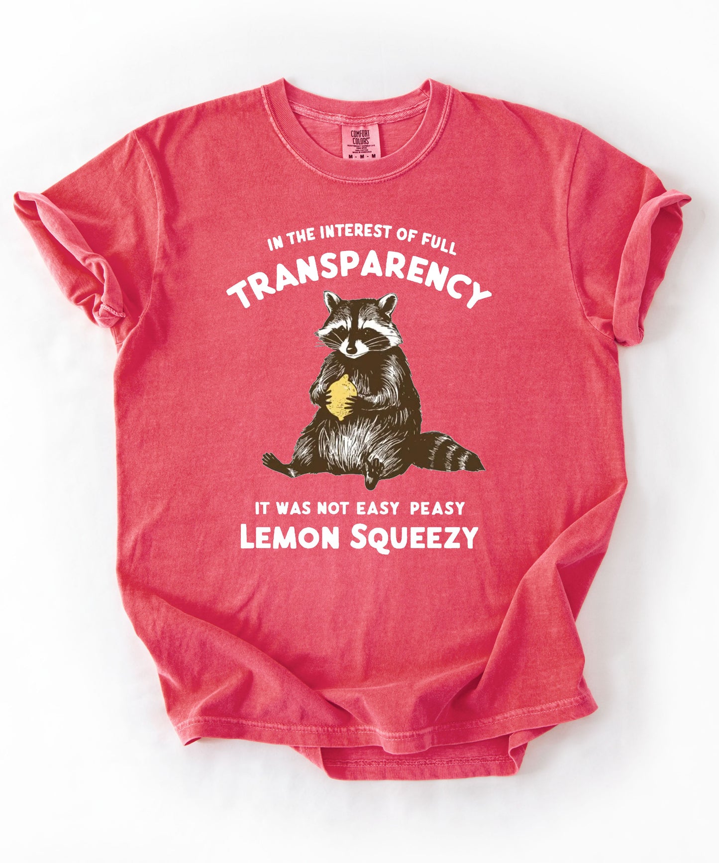 Funny raccoon sarcastic meme t-shirt in Watermelon — "Was Not Easy Peasy Lemon Squeezy" graphic tee