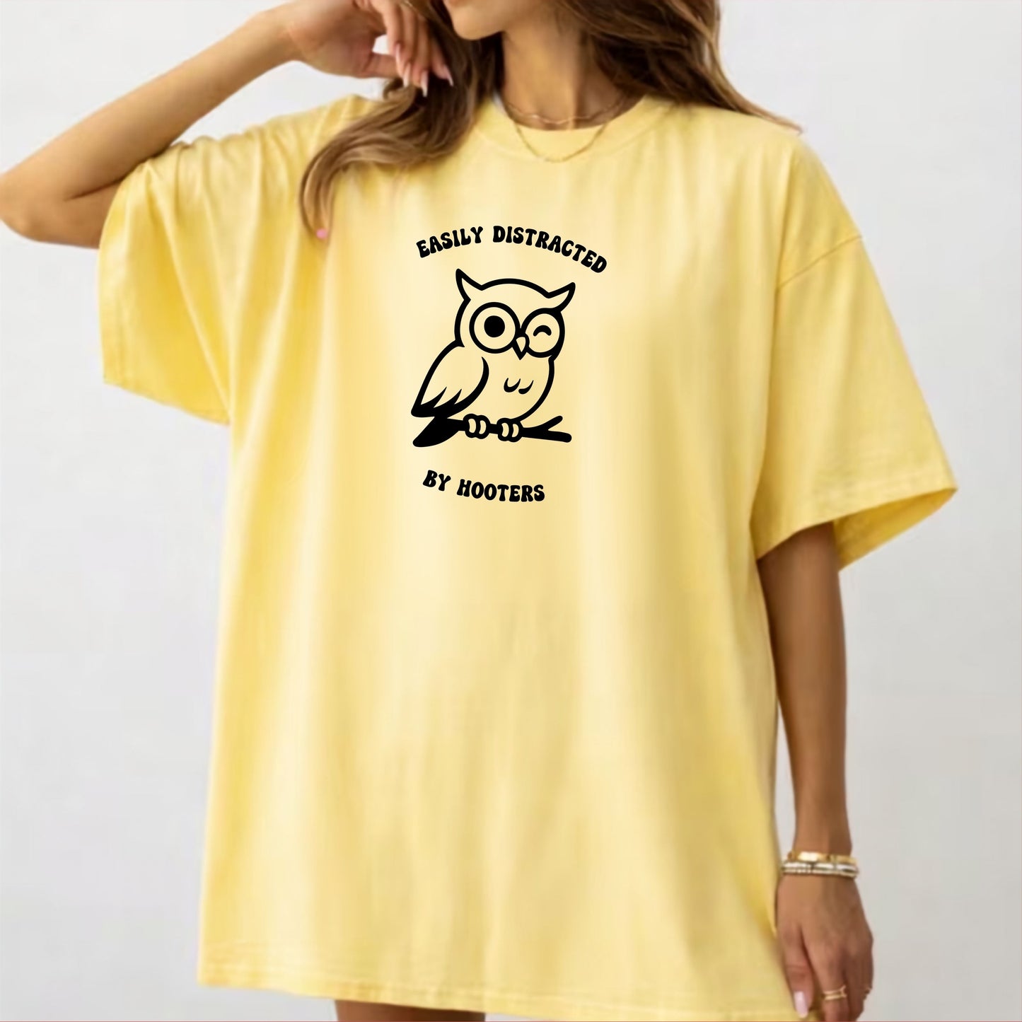 asily Distracted by Hooters funny owl graphic tee in Butter – GodaStudio