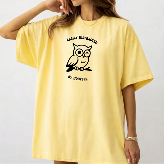 asily Distracted by Hooters funny owl graphic tee in Butter – GodaStudio