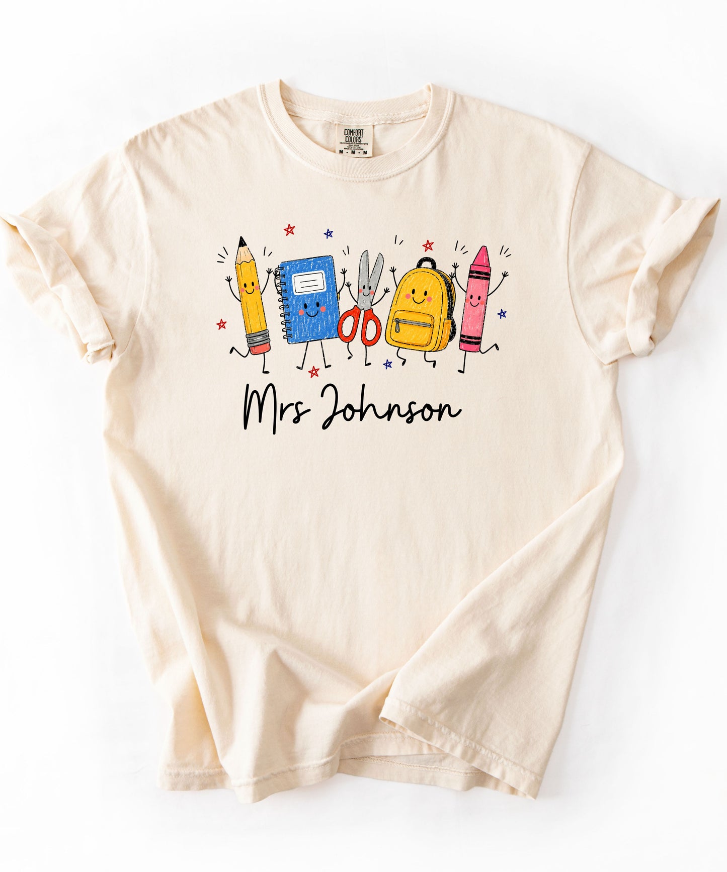 Personalized teacher t-shirt in Ivory with custom name printed on front — soft garment-dyed cotton tee, sizes S–4XL