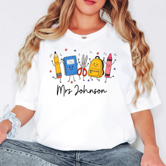 Personalized teacher t-shirt in White with custom name printed on front — soft garment-dyed cotton tee, sizes S–4XL