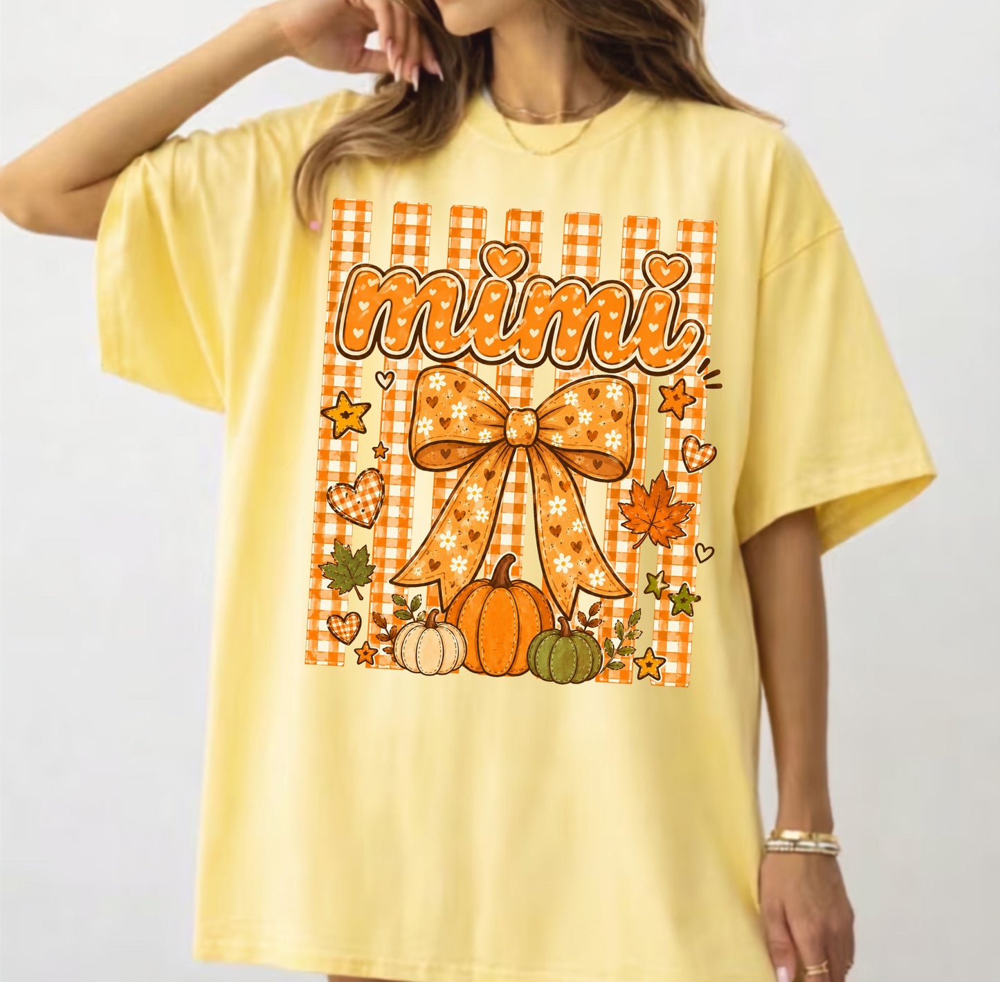 Mimi fall pumpkin graphic tee in Butter — coquette bow and gingham design, relaxed fit
