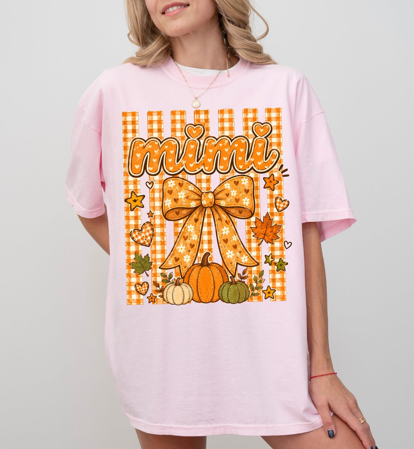 Mimi fall pumpkin graphic tee in Blossom — coquette bow and gingham design, relaxed fit
