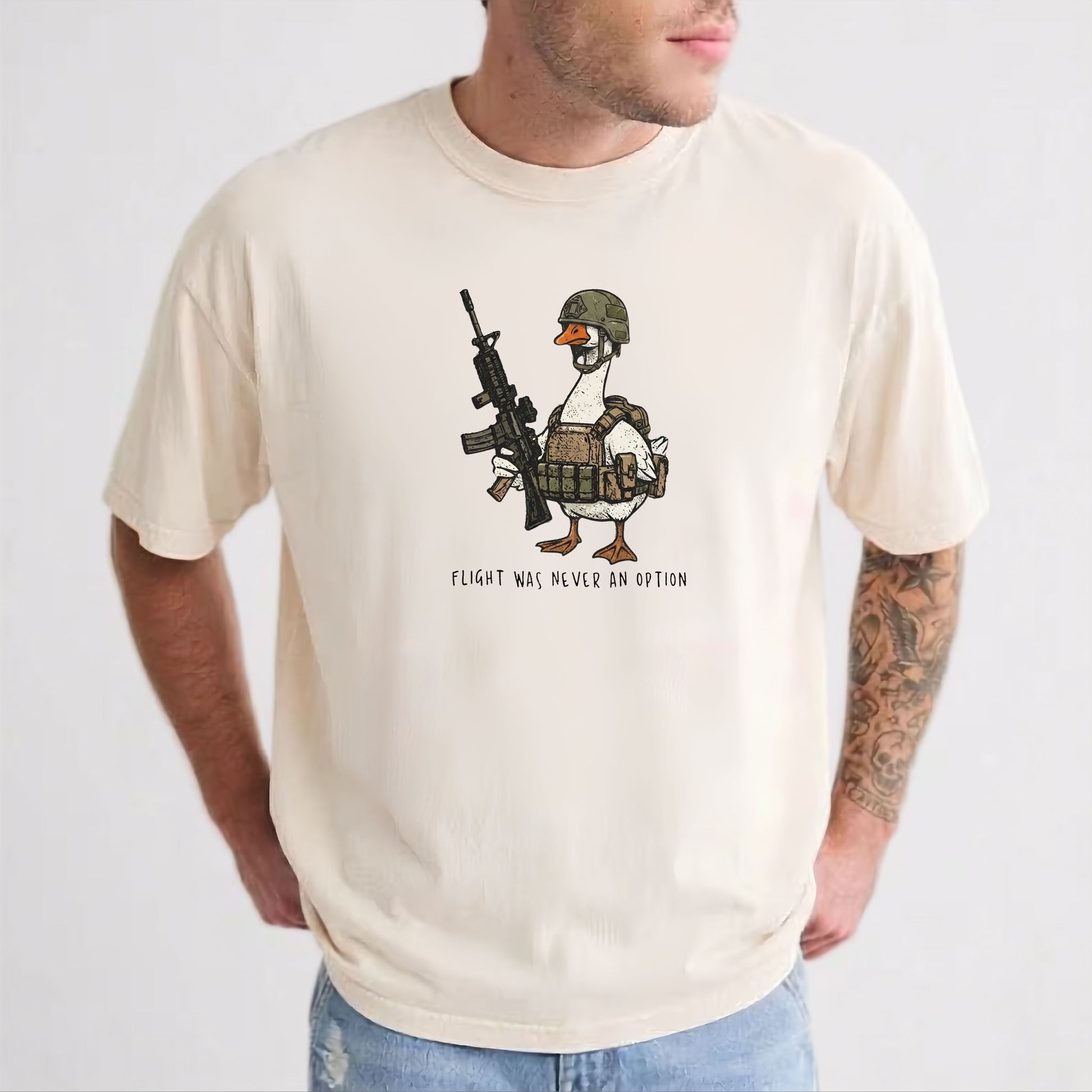 Ivory garment-dyed unisex tactical goose graphic tee — Flight Was Never an Option silly goose shirt