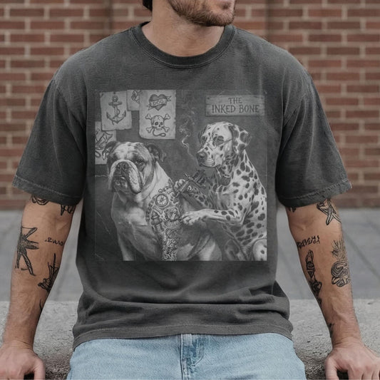 Tattooed man wearing pepper garment-dyed graphic tee with Bulldog and Dalmatian tattoo parlor illustration — The Inked Bone vintage dog art shirt