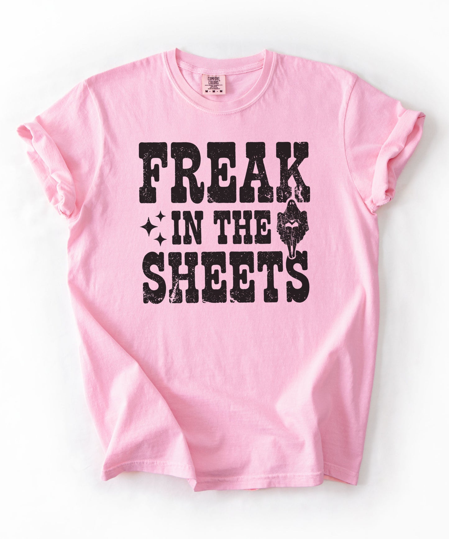 Blossom Comfort Colors Freak in the Sheets funny Halloween ghost graphic tee — distressed western lettering with ghost and sparkle accents, flat lay