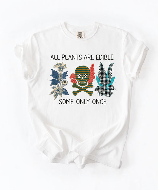 All plants are edible some only once funny botanical graphic t-shirt in white, garment-dyed cotton tee with skull design