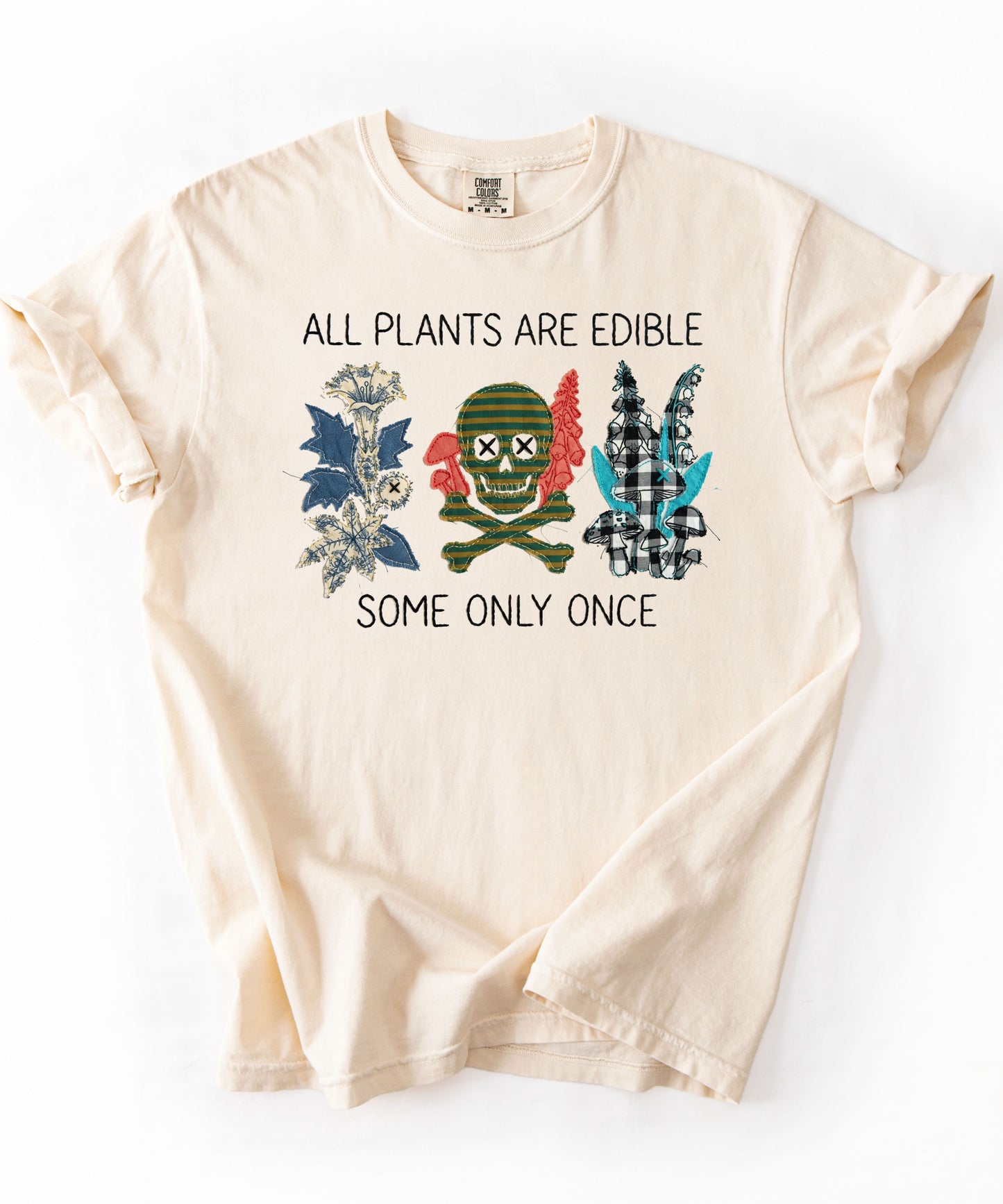 All plants are edible some only once funny botanical graphic t-shirt in Ivory, garment-dyed cotton tee with skull design
