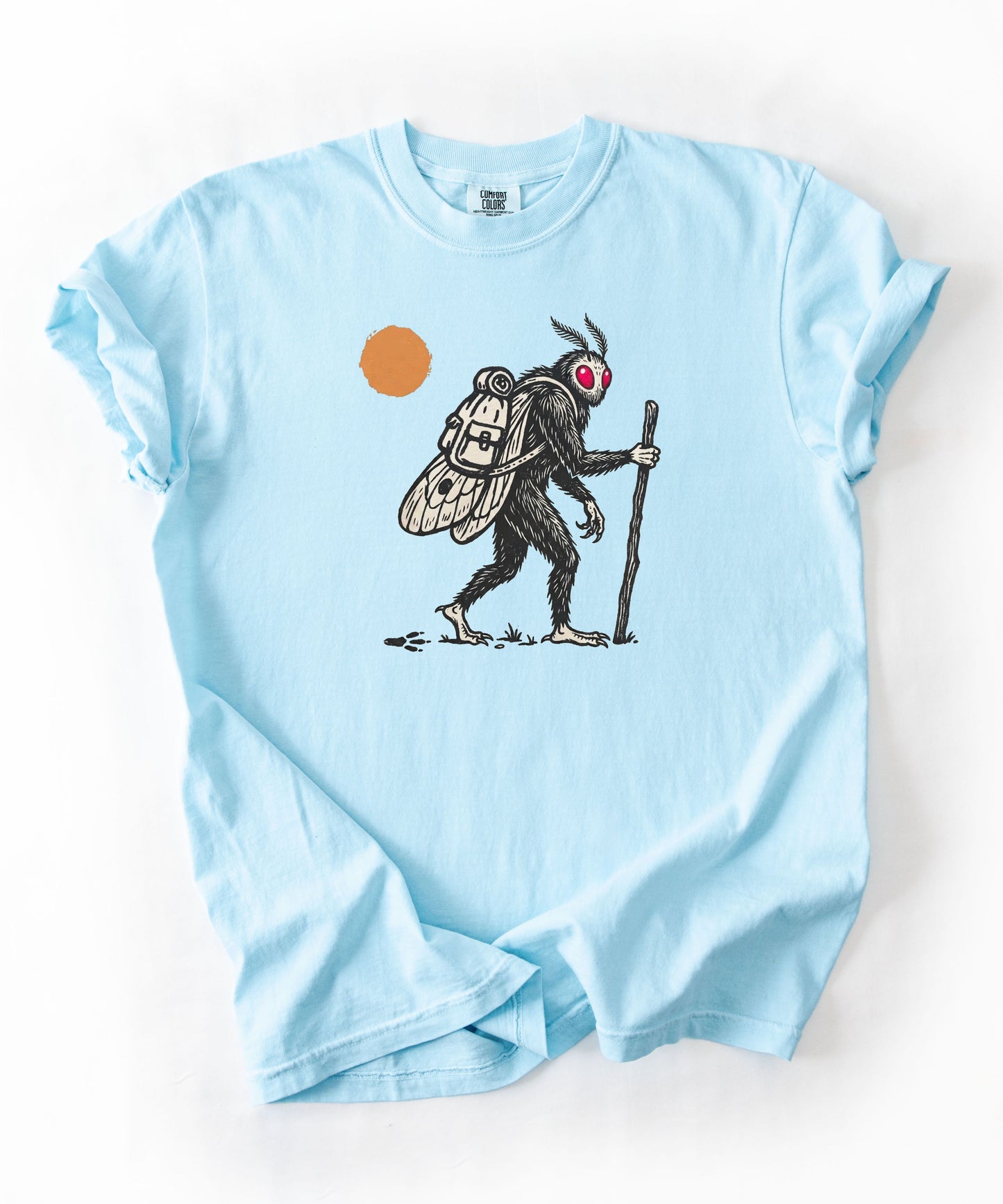 Mothman Traveler Graphic T-Shirt in Chambray— backpacking cryptid tee with sun