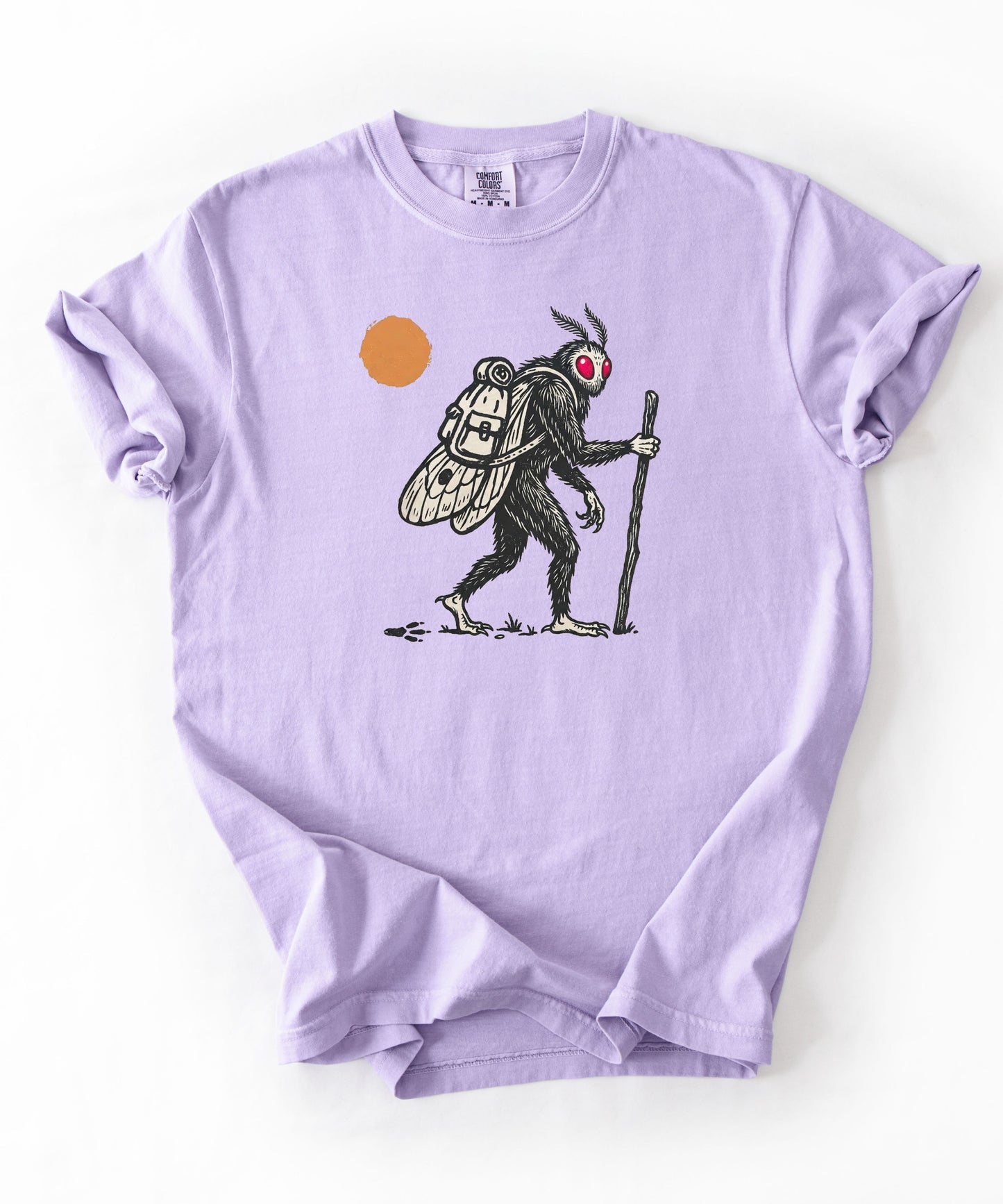 Mothman Traveler Graphic T-Shirt in Orchid — backpacking cryptid tee with sun
