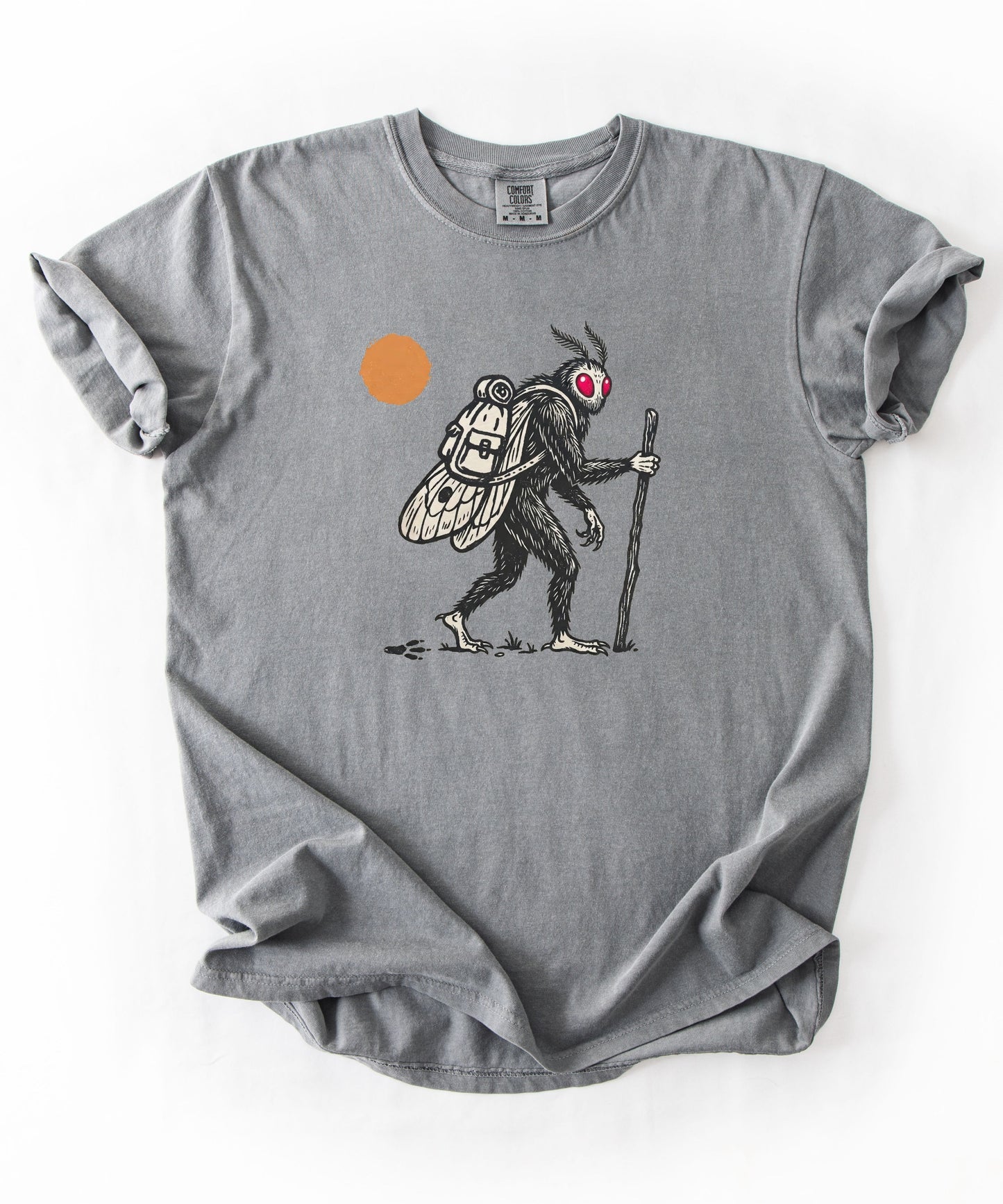 Mothman Traveler Graphic T-Shirt in Grey— backpacking cryptid tee with sun