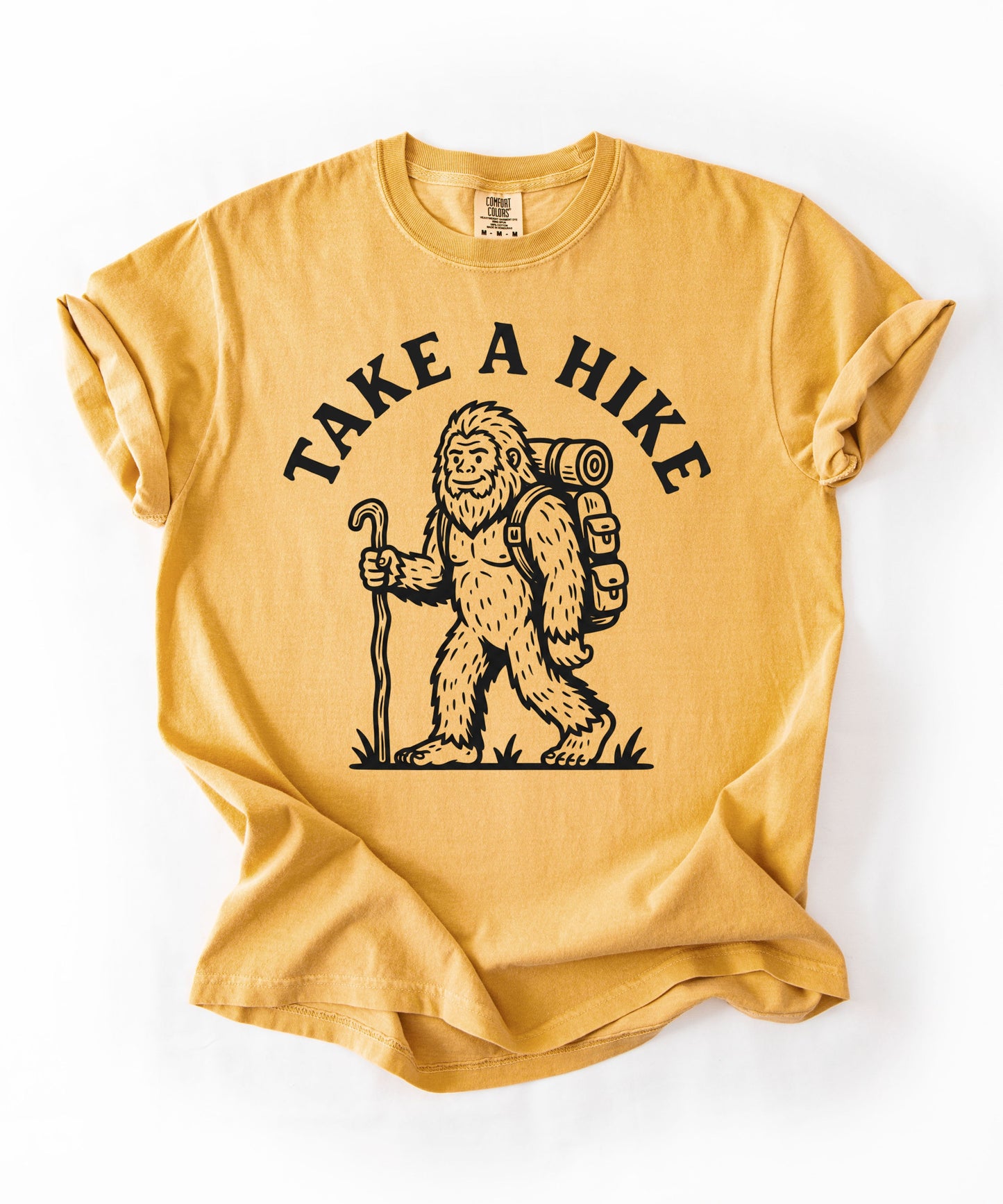 Take a Hike T-Shirt in Mustard — Bigfoot hiking graphic tee