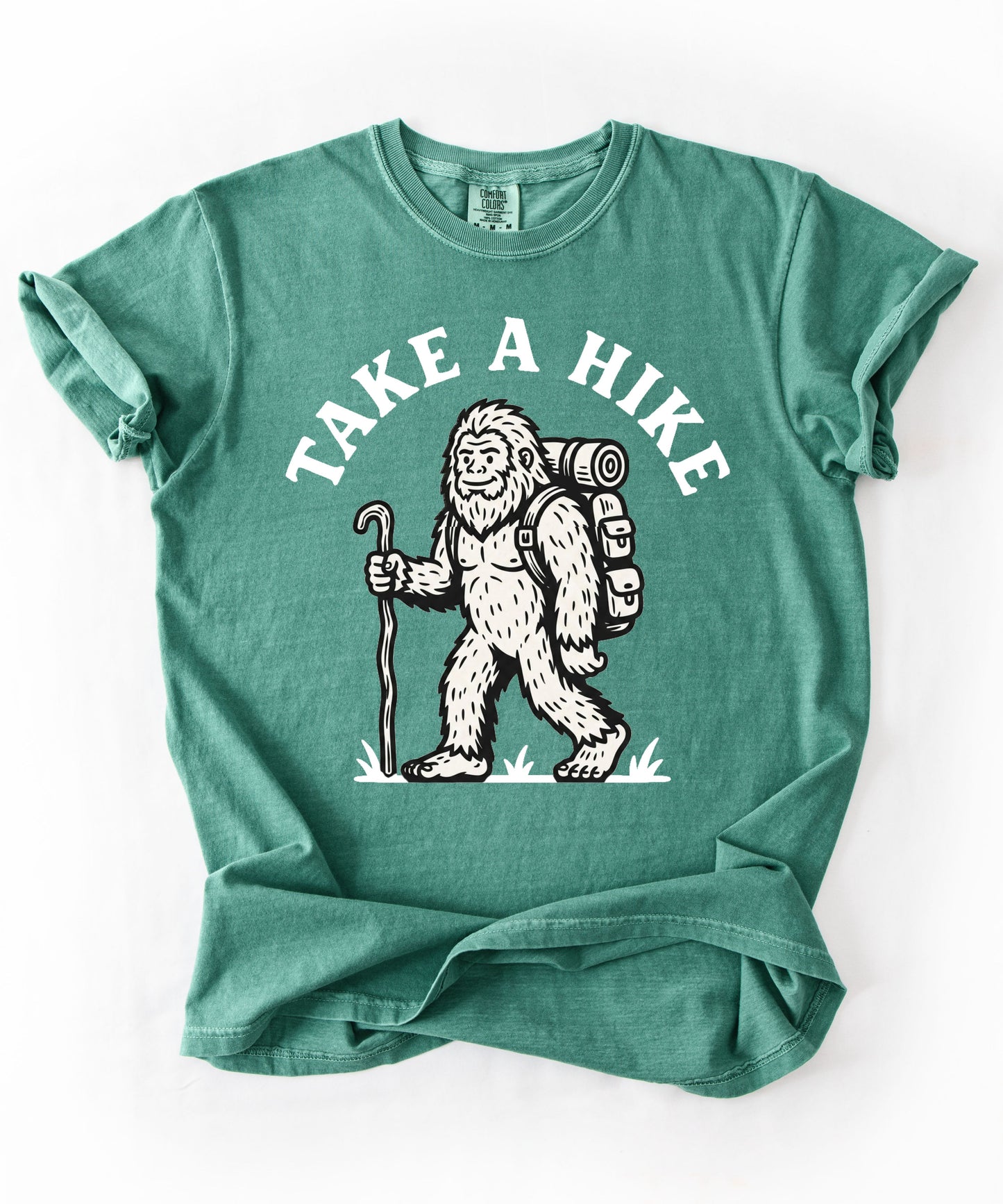 Take a Hike T-Shirt in Light Green— Bigfoot hiking graphic tee