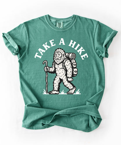 Take a Hike T-Shirt in Light Green— Bigfoot hiking graphic tee
