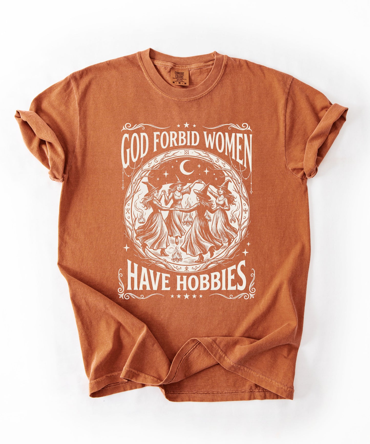 God Forbid Women Have Hobbies graphic t-shirt in Yam — vintage witch circular print on garment-dyed heavyweight cotton tee.